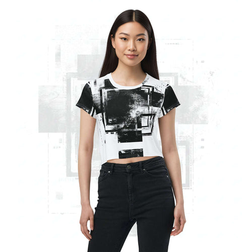 Model wearing Form Finding Design Women’s Era Stamp (No.04) crop tee; bold monochrome distressed geometry print on the front, styled with black jeans against a soft white textured backdrop.
