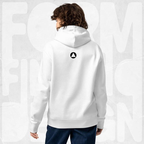 Back view on model: white Women’s Signature Hoodie (FFD-05) by Form Finding Design—minimal back with small black triangle emblem below hood, clean studio background.