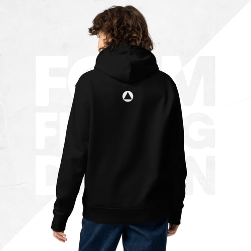 Back view on model: black Women’s Signature Hoodie (FFD-12) by Form Finding Design—minimal back with small white triangle emblem below hood, clean studio background.