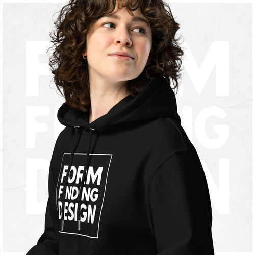 Close-up of black Form Finding Design Signature Hoodie (FFD-18)—hood, drawstrings and chest print detail showing the white square “FORM FINDING DESIGN” iconography graphic.