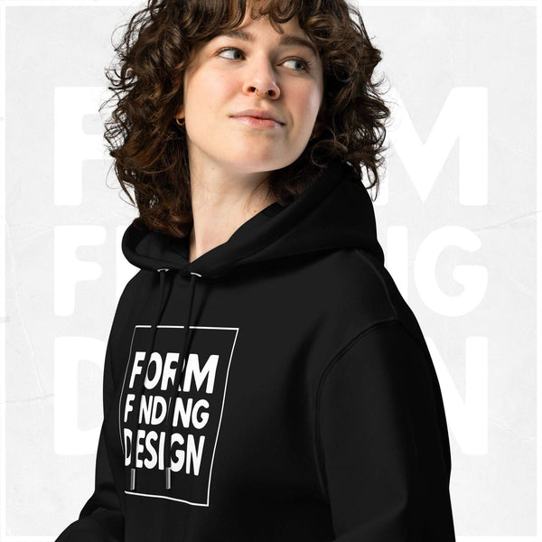 Close-up of black Form Finding Design Signature Hoodie (FFD-18)—hood, drawstrings and chest print detail showing the white square “FORM FINDING DESIGN” iconography graphic.