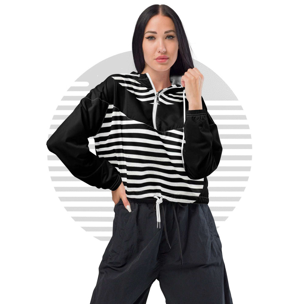 Front pose of model in white colourway ICN Cropped Windbreaker—half-zip cropped windbreaker with bold horizontal stripe band and angular geometric panels, neutral graphic background from Form Finding Design.