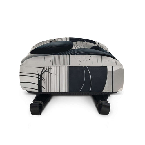 Bottom view of Form Finding Design AD8 backpack showing the base and wraparound monochrome geometric print, textured fabric finish, and the lower strap anchors for a clean, minimal designer backpack look.