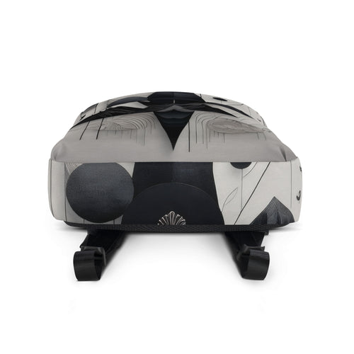 Bottom view of Form Finding Design AD9 backpack showing the base and wraparound monochrome geometric print, textured fabric finish, and the lower strap anchors for a clean, minimal designer backpack look.