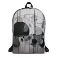 Form Finding Design AD backpack – front view of medium all-over print backpack with monochrome abstract geometric artwork in black, charcoal and pale grey, large front pocket panel, top carry loop and black straps.