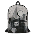 Form Finding Design AD2 backpack – front view of medium all-over print backpack with monochrome abstract geometric artwork in black, charcoal and pale grey, large front pocket panel, top carry loop and black straps.