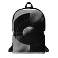 MC8 “Abyss” FFD backpack by Form Finding Design, front view—monochrome abstract print in black, charcoal and grey, large front zip pocket, top handle, clean white background.