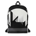 Form Finding Design AG8 backpack, front view on white background — medium all-over print backpack with bold black-and-white abstract geometric collage artwork, top carry handle and zip front pocket.