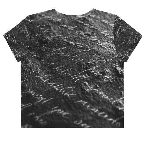 Flat studio mockup of Form Finding Design “Women’s Era Print (No.13)” crop tee, back — monochrome handwritten script collage across body and sleeves; crew neck, cropped hem; The Signature Collective.