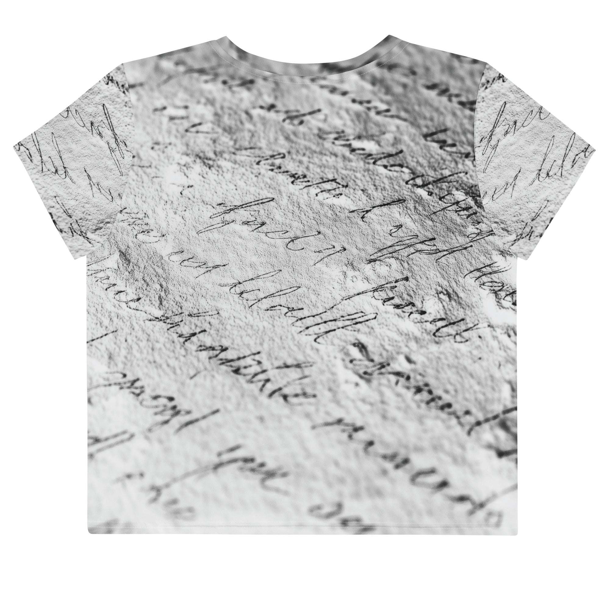 Flat studio mockup of Form Finding Design “Women’s Era Print (No.14)” crop tee, back — monochrome handwritten script collage across body and sleeves; crew neck, cropped hem; The Signature Collective.