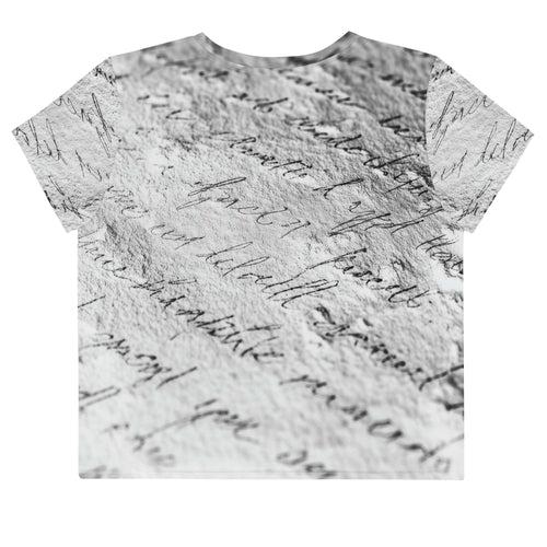 Flat studio mockup of Form Finding Design “Women’s Era Print (No.14)” crop tee, back — monochrome handwritten script collage across body and sleeves; crew neck, cropped hem; The Signature Collective.