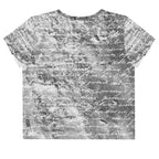 Flat studio mockup of Form Finding Design “Women’s Era Print (No.18)” crop tee, back — monochrome handwritten script collage across body and sleeves; crew neck, cropped hem; The Signature Collective.
