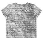 Flat studio mockup of Form Finding Design “Women’s Era Print (No.18)” crop tee, back — monochrome handwritten script collage across body and sleeves; crew neck, cropped hem; The Signature Collective.