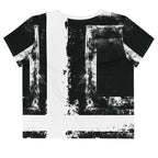 Back view of Women's Era Stamp (No.02) crop top with bold black and white geometries, distressed ink texture, crew neck, short sleeves.
