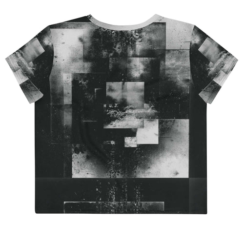 Back view of Women's Era Stamp (No.05) crop top with bold black and white geometries, distressed ink texture, crew neck, short sleeves.