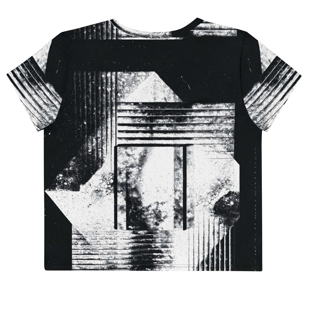 Back view of Women's Era Stamp (No.07) crop top with bold black and white geometries, distressed ink texture, crew neck, short sleeves.