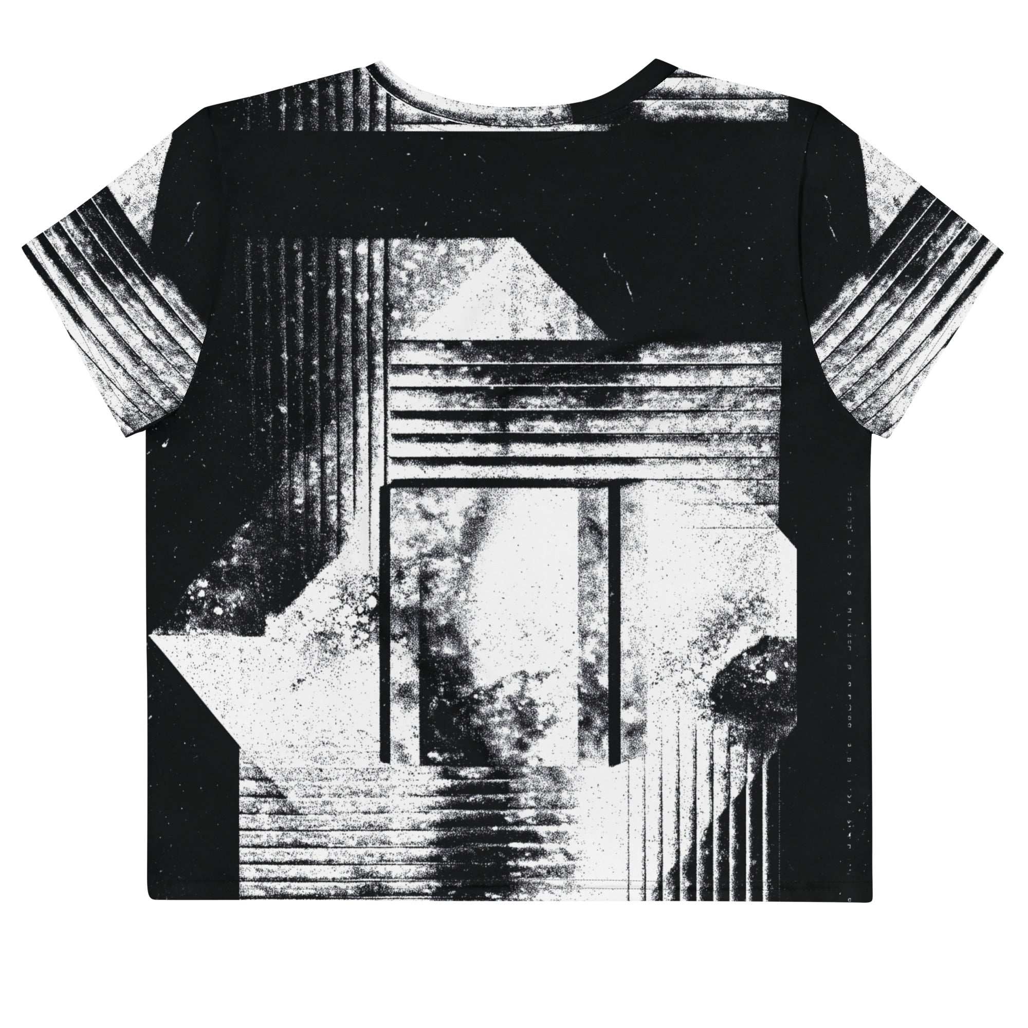 Back view of Women's Era Stamp (No.07) crop top with bold black and white geometries, distressed ink texture, crew neck, short sleeves.