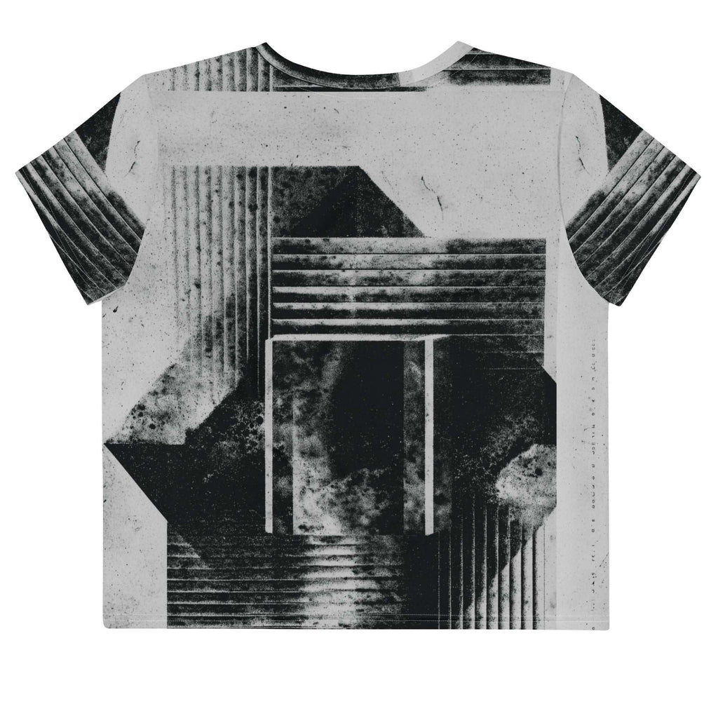 Back view of Women's Era Stamp (No.08) crop top with bold black and white geometries, distressed ink texture, crew neck, short sleeves.