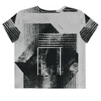 Back view of Women's Era Stamp (No.08) crop top with bold black and white geometries, distressed ink texture, crew neck, short sleeves.