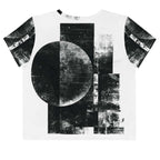 Back view of Women's Era Stamp (No.10) crop top with bold black and white geometries, distressed ink texture, crew neck, short sleeves.