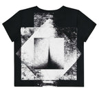 Back view of Women's Era Stamp (No.11) crop top with bold black and white geometries, distressed ink texture, crew neck, short sleeves.