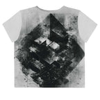 Back view of Women's Era Stamp (No.16) crop top with bold black and white geometries, distressed ink texture, crew neck, short sleeves.