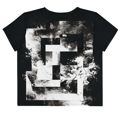 Back view of Women's Era Stamp (No.17) crop top with bold black and white geometries, distressed ink texture, crew neck, short sleeves.