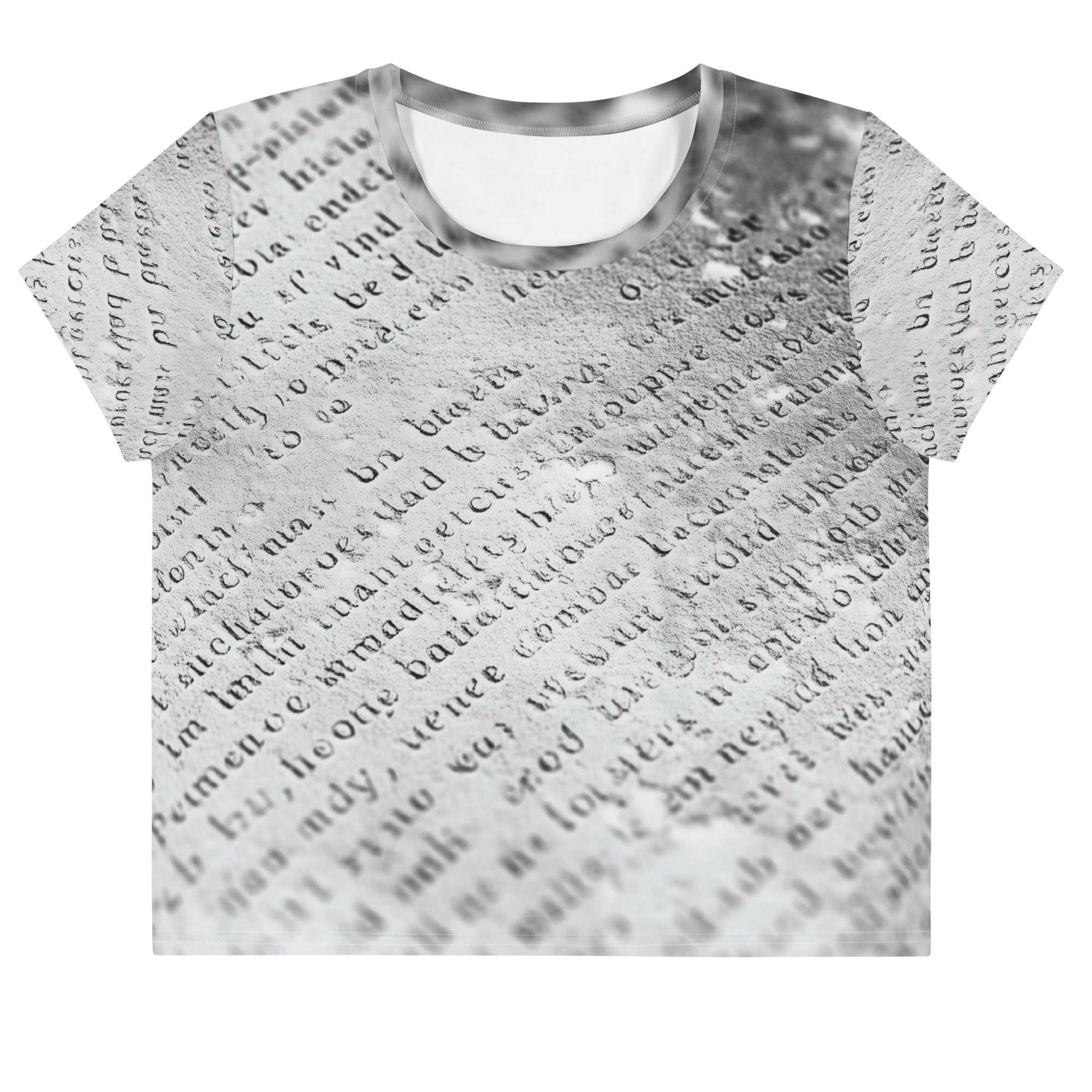 Flat studio mockup of Form Finding Design “Women’s Era Print (No.16)” crop tee, front — monochrome handwritten script collage across body and sleeves; crew neck, cropped hem; The Signature Collective.