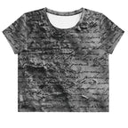 Flat studio mockup of Form Finding Design “Women’s Era Print (No.17)” crop tee, front — monochrome handwritten script collage across body and sleeves; crew neck, cropped hem; The Signature Collective.