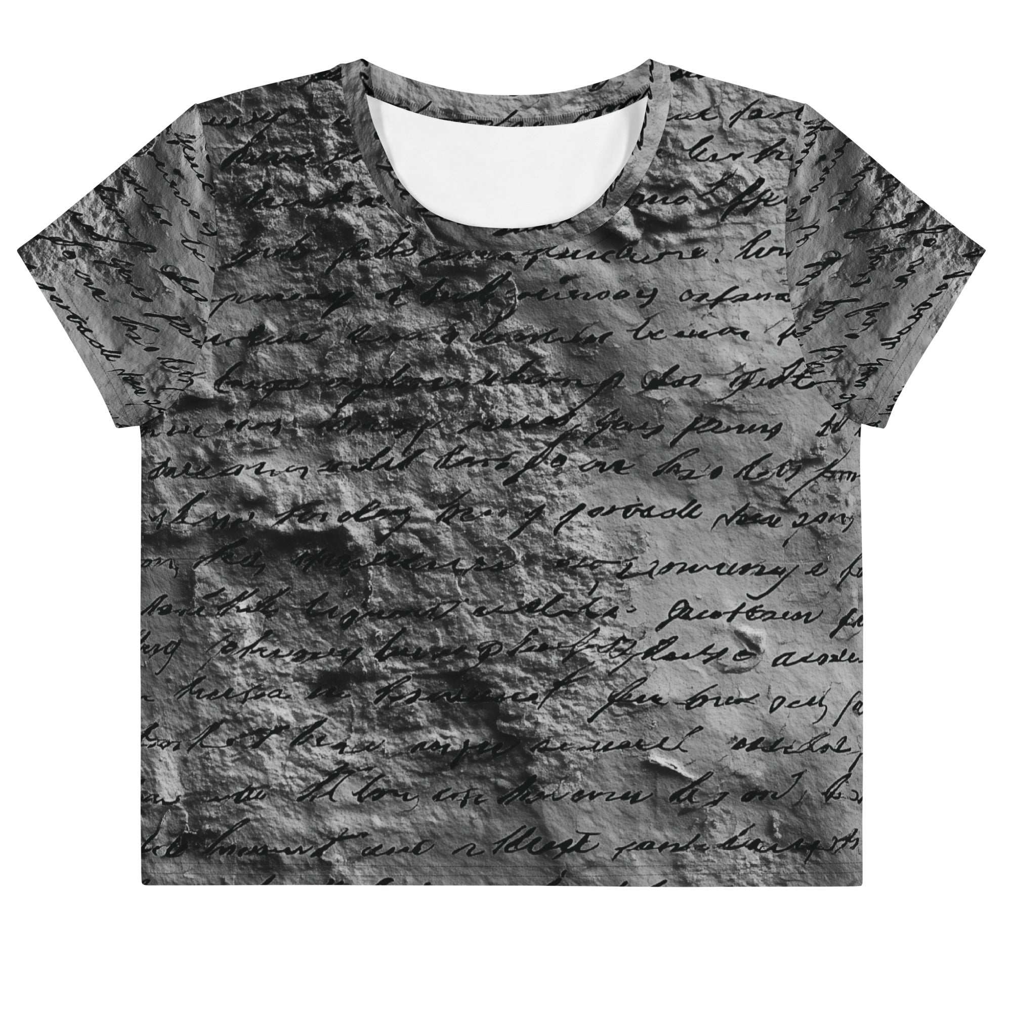 Flat studio mockup of Form Finding Design “Women’s Era Print (No.17)” crop tee, front — monochrome handwritten script collage across body and sleeves; crew neck, cropped hem; The Signature Collective.