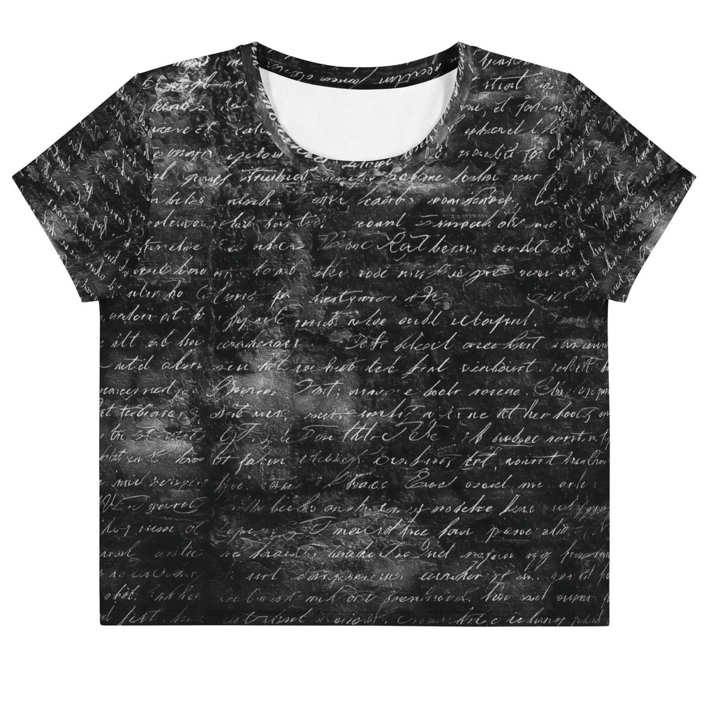Flat studio mockup of Form Finding Design “Women’s Era Print (No.19)” crop tee, front — monochrome handwritten script collage across body and sleeves; crew neck, cropped hem; The Signature Collective.