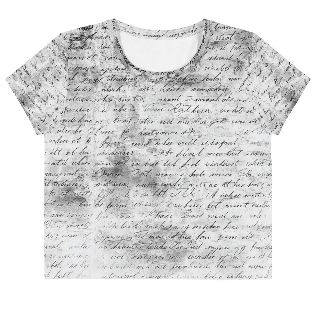 Flat studio mockup of Form Finding Design “Women’s Era Print (No.20)” crop tee, front — monochrome handwritten script collage across body and sleeves; crew neck, cropped hem; The Signature Collective.