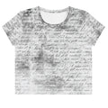 Flat studio mockup of Form Finding Design “Women’s Era Print (No.20)” crop tee, front — monochrome handwritten script collage across body and sleeves; crew neck, cropped hem; The Signature Collective.