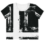 Front view of Women's Era Stamp (No.02) crop top with bold black and white geometries, distressed ink texture, crew neck, short sleeves.