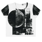 Front view of Women's Era Stamp (No.10) crop top with bold black and white geometries, distressed ink texture, crew neck, short sleeves.