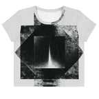 Front view of Women's Era Stamp (No.12) crop top with bold black and white geometries, distressed ink texture, crew neck, short sleeves.
