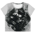 Front view of Women's Era Stamp (No.16) crop top with bold black and white geometries, distressed ink texture, crew neck, short sleeves.
