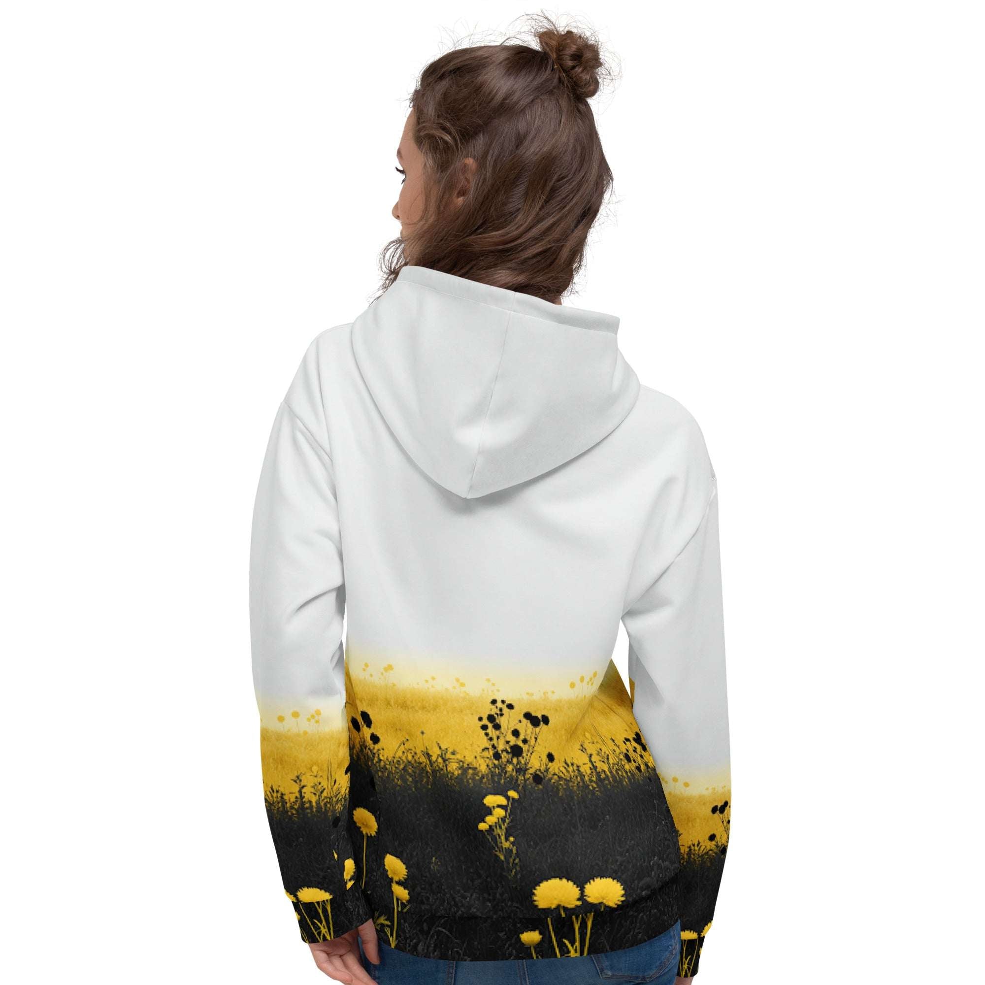 An FFD Luminescence hoodie (back model pose) with a black, white and yellow gradient print of a nature-inspired design featuring hues of white yellow and black tones.