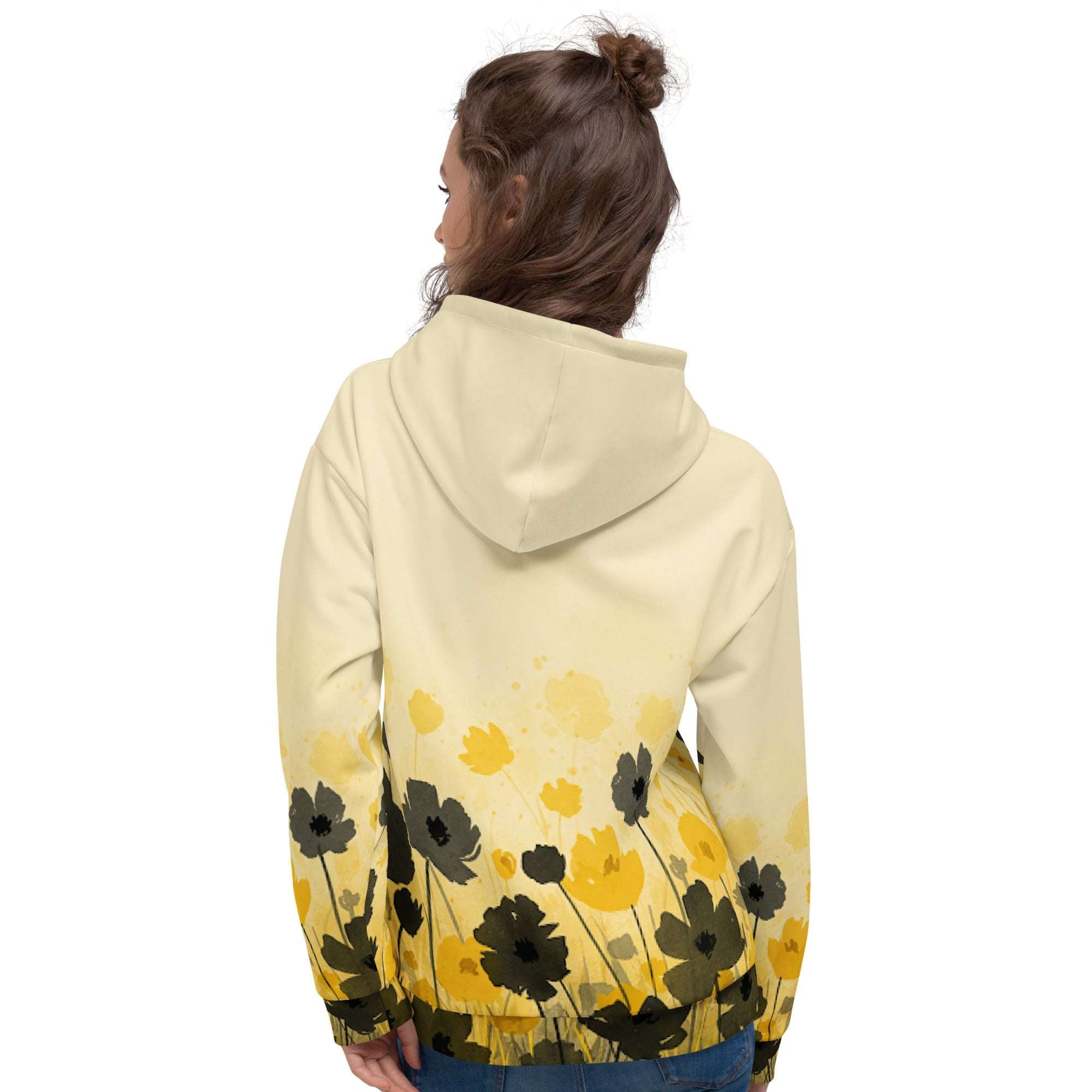 An FFD Luminescence-4 hoodie (back model pose) with a black, white and yellow gradient print of a nature-inspired design featuring hues of white yellow and black tones.