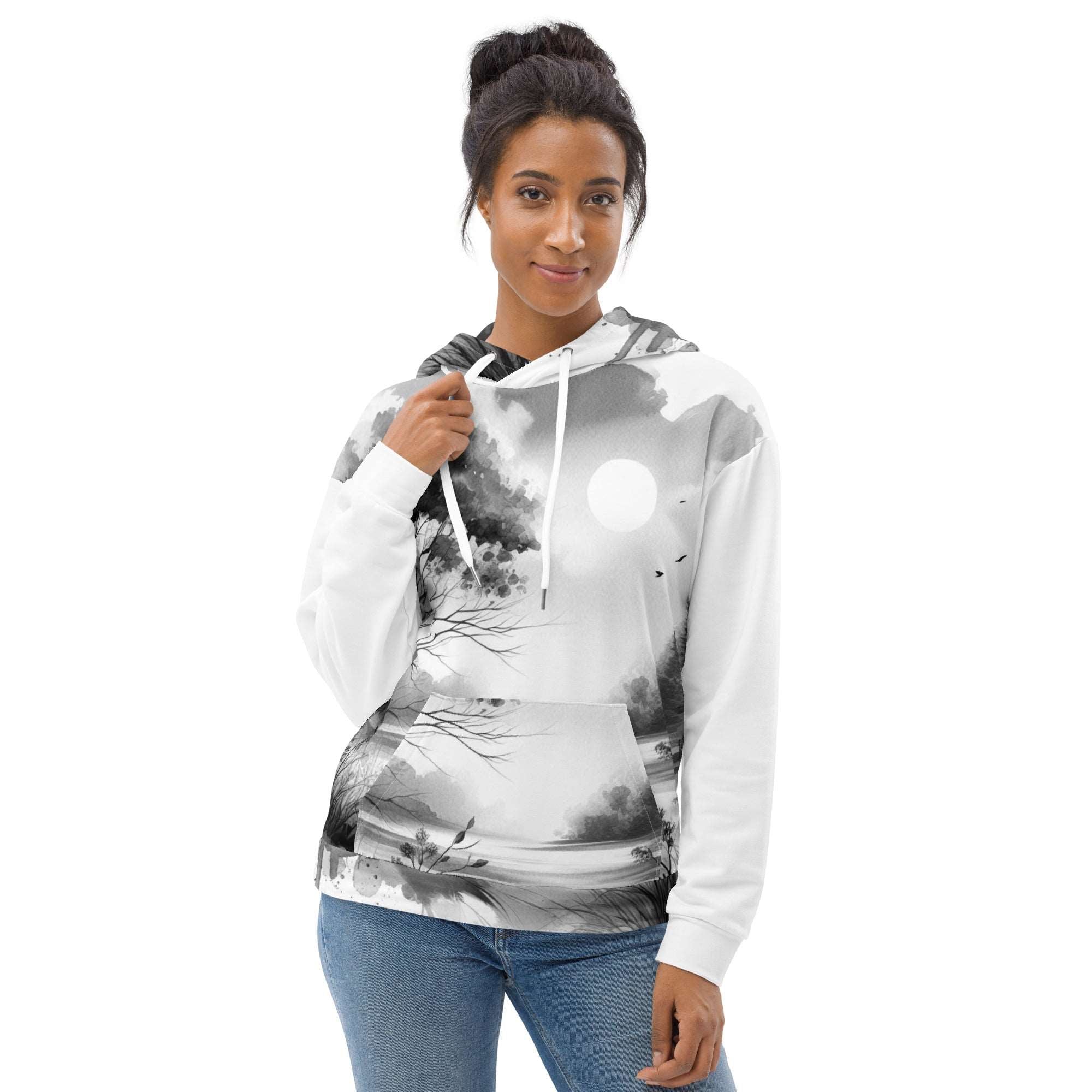 “Women’s Watercolour-Print-10 Muse Hoodie side model in white with gray hand-painted landscape design, featuring abstract mountains and trees, kangaroo pocket, and adjustable drawstring hood.”