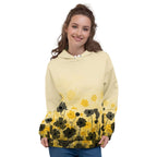 An FFD Luminescence-4 hoodie (front model pose) with a black, white and yellow gradient print of a nature-inspired design featuring hues of white yellow and black tones.