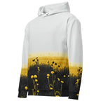 An FFD Luminescence hoodie (side pose) with a black, white and yellow gradient print of a nature-inspired design featuring hues of white yellow and black tones.