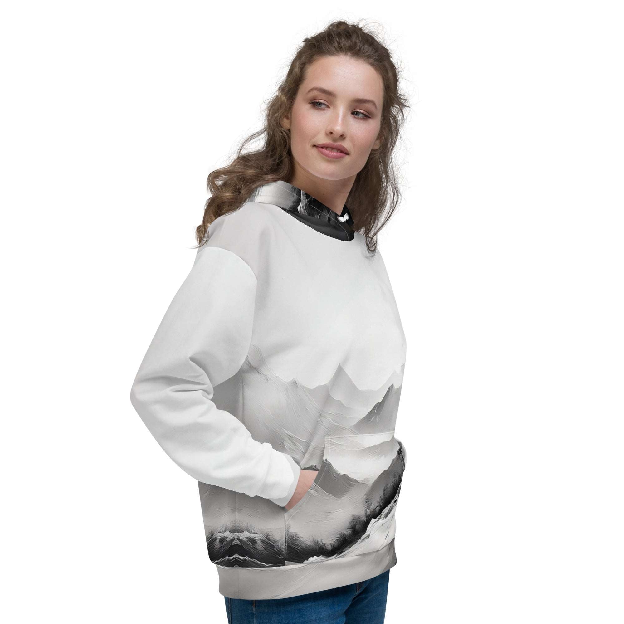 “Women’s Watercolour-Print-11 Muse Hoodie side model in white with gray hand-painted landscape design, featuring abstract mountains and trees, kangaroo pocket, and adjustable drawstring hood.”