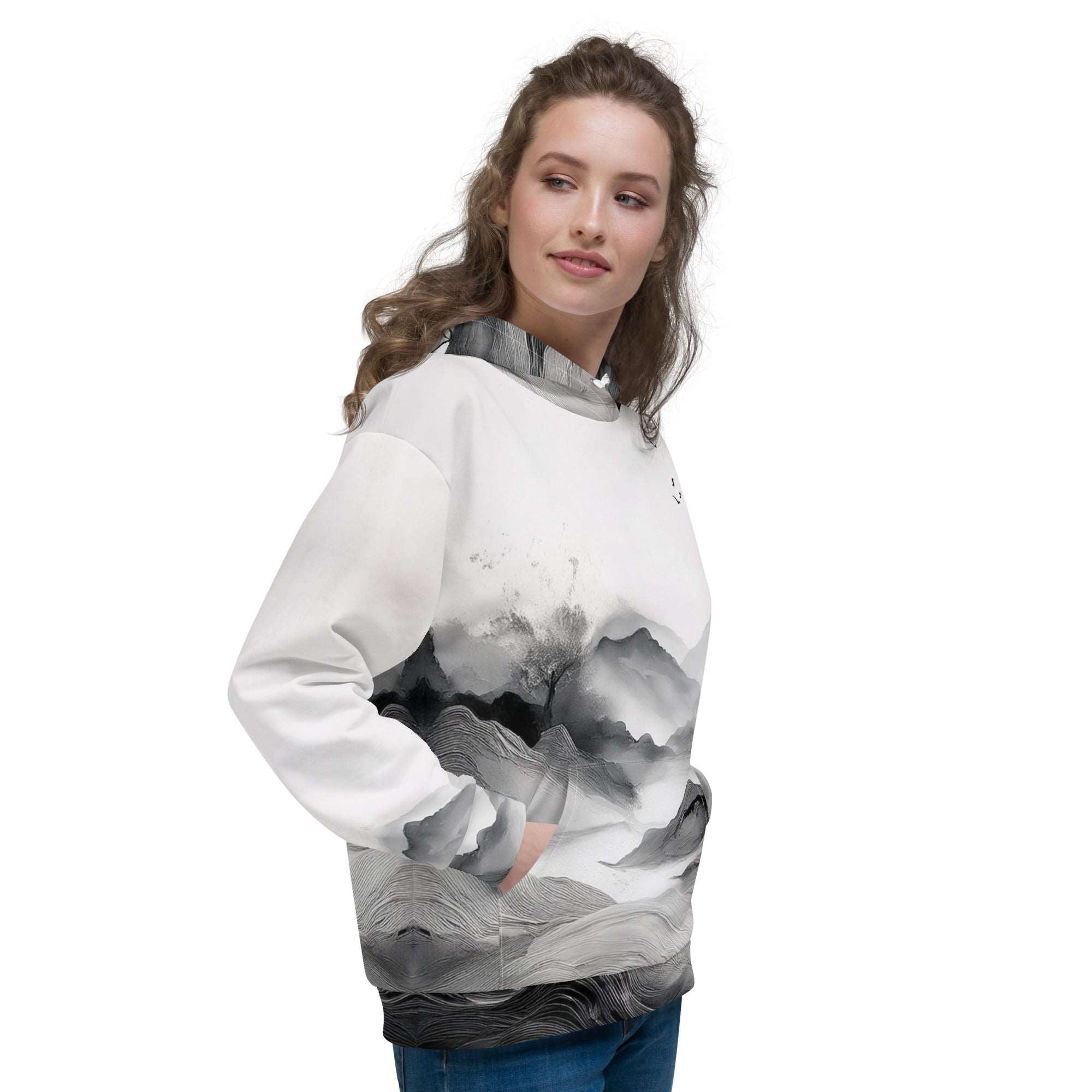 “Women’s Watercolour-Print-15 Muse Hoodie side model in white with gray hand-painted landscape design, featuring abstract mountains and trees, kangaroo pocket, and adjustable drawstring hood.”