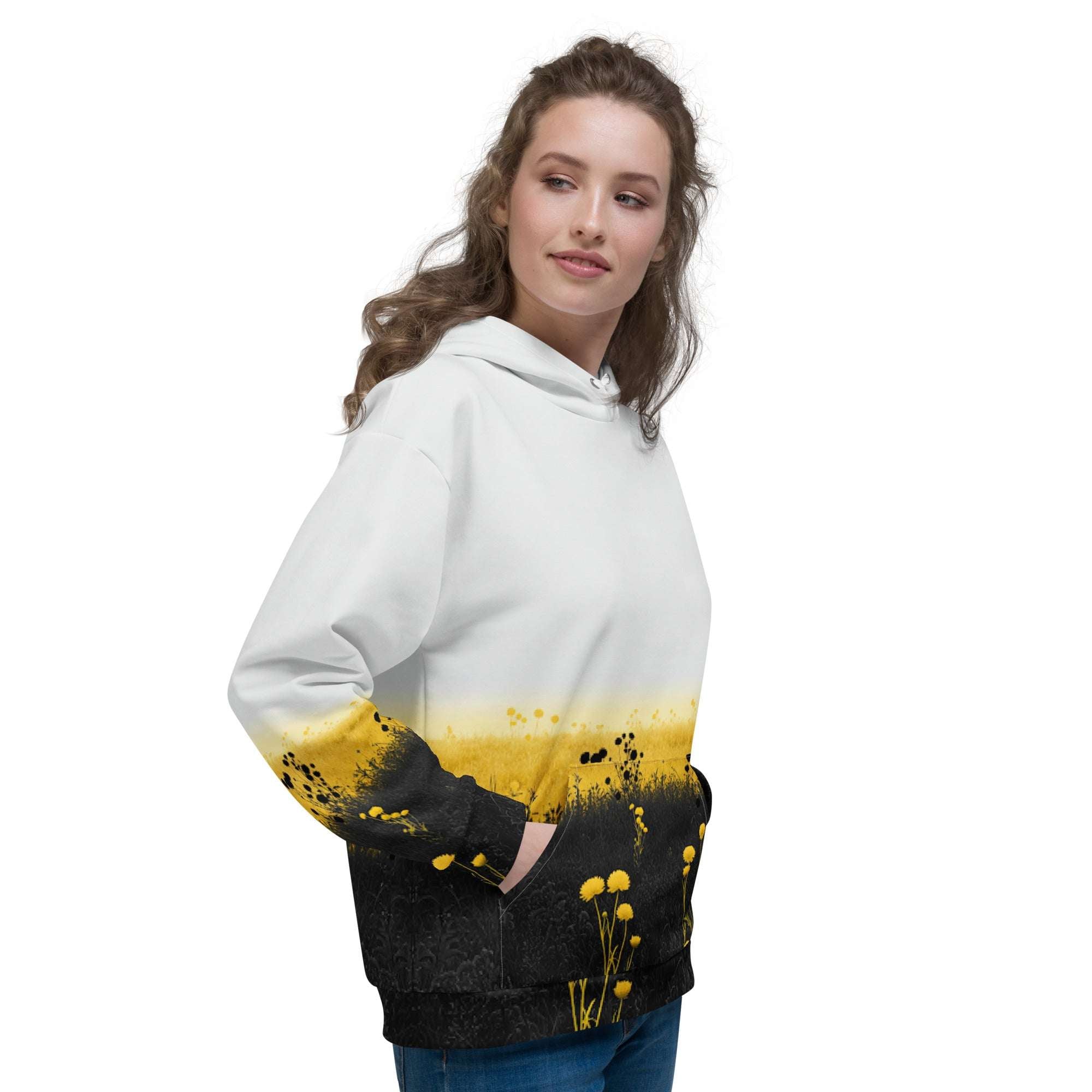 An FFD Luminescence hoodie (side model pose) with a black, white and yellow gradient print of a nature-inspired design featuring hues of white yellow and black tones.