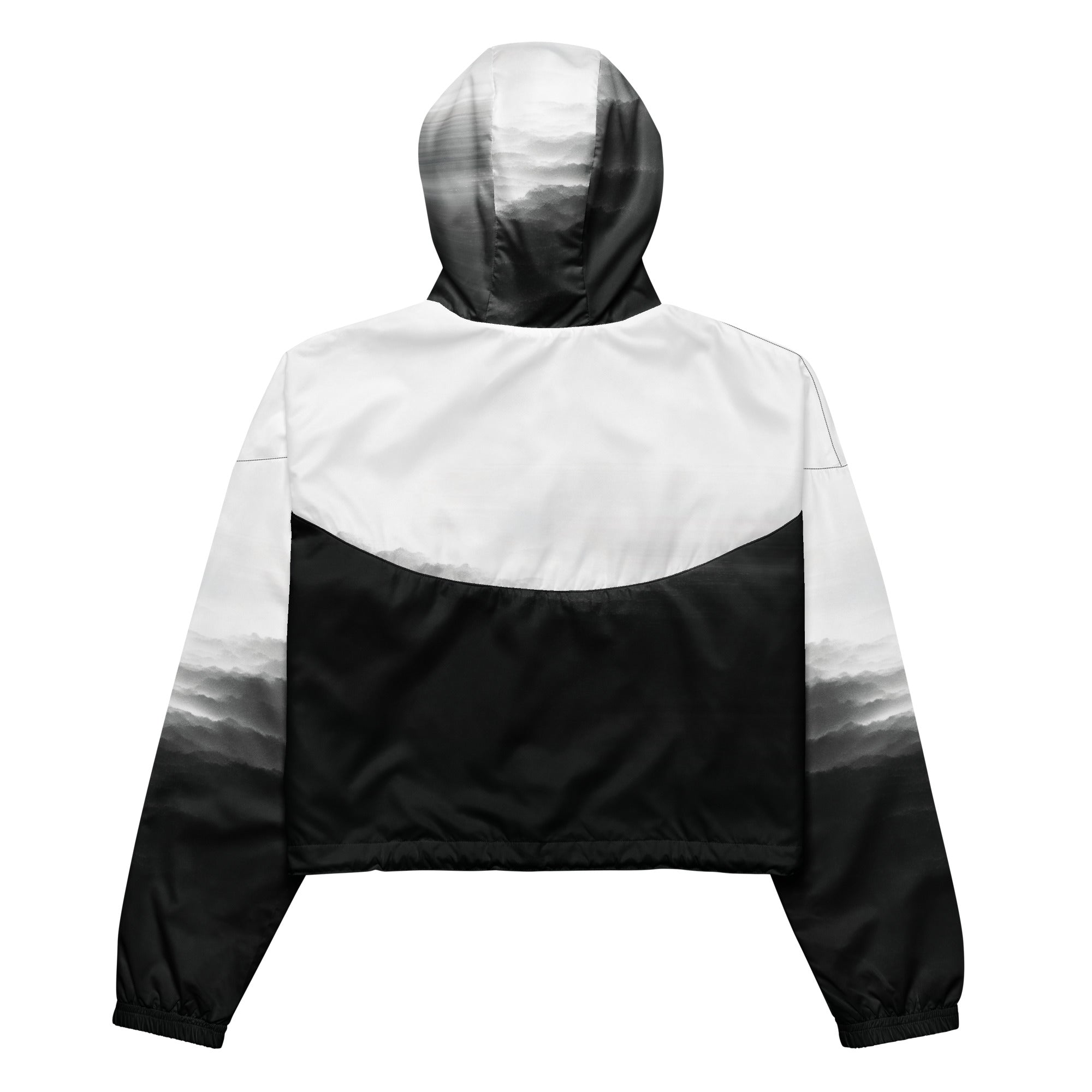 Back studio view of the HER Cropped Dither Distortion Windbreaker (No.03), showing the hood and cropped silhouette. The digital distortion print runs from light grey at the upper back to deep charcoal at the hem; the hood’s outer panels are colour‑blocked in black and white, and the elasticated hem is cinched with a drawcord, all set against a clean white backdrop