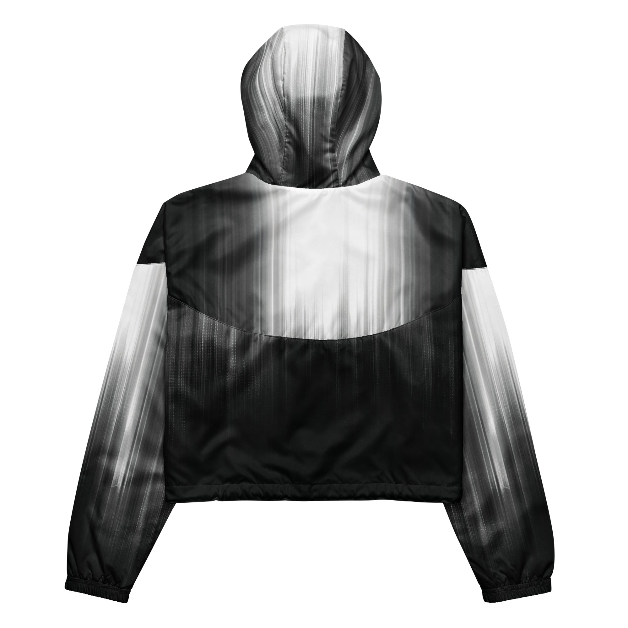Back studio view of the HER Cropped Dither Distortion Windbreaker (No.04), showing the hood and cropped silhouette. The digital distortion print runs from light grey at the upper back to deep charcoal at the hem; the hood’s outer panels are colour‑blocked in black and white, and the elasticated hem is cinched with a drawcord, all set against a clean white backdrop