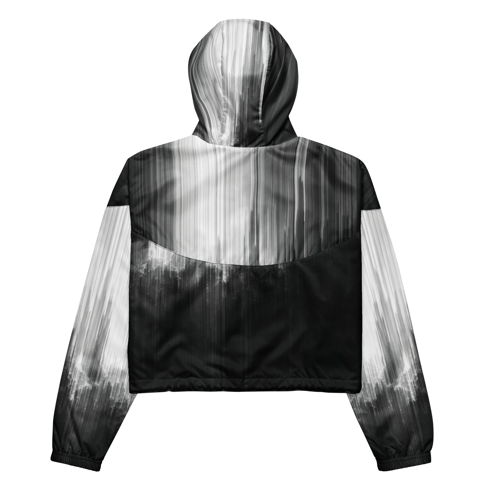 Back studio view of the HER Cropped Dither Distortion Windbreaker (No.06), showing the hood and cropped silhouette. The digital distortion print runs from light grey at the upper back to deep charcoal at the hem; the hood’s outer panels are colour‑blocked in black and white, and the elasticated hem is cinched with a drawcord, all set against a clean white backdrop