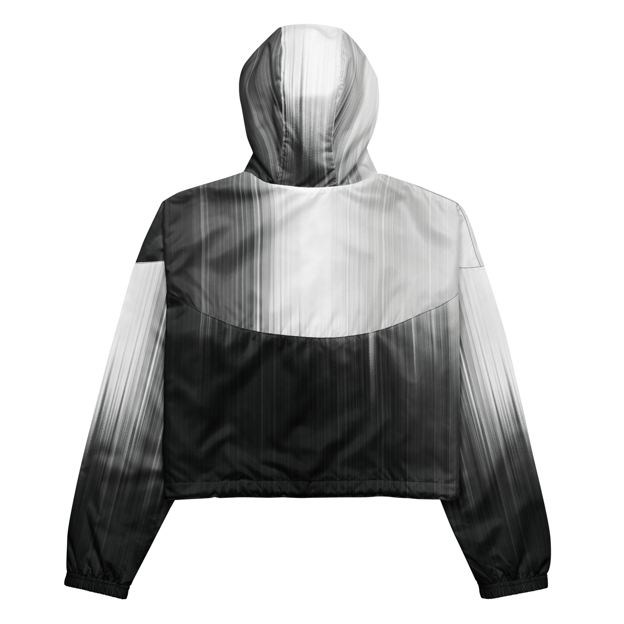 Back studio view of the HER Cropped Dither Distortion Windbreaker (No.08), showing the hood and cropped silhouette. The digital distortion print runs from light grey at the upper back to deep charcoal at the hem; the hood’s outer panels are colour‑blocked in black and white, and the elasticated hem is cinched with a drawcord, all set against a clean white backdrop