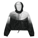 HER Cropped Dither Distortion Windbreaker (No.05) by Form Finding Design, front studio view — cropped hooded jacket with a monochrome graphic distortion print fading from white at the shoulders to dark charcoal at the hem. Features a half‑zip front, black drawstrings, long sleeves and an elasticated hem with a drawcord, displayed on a plain white background